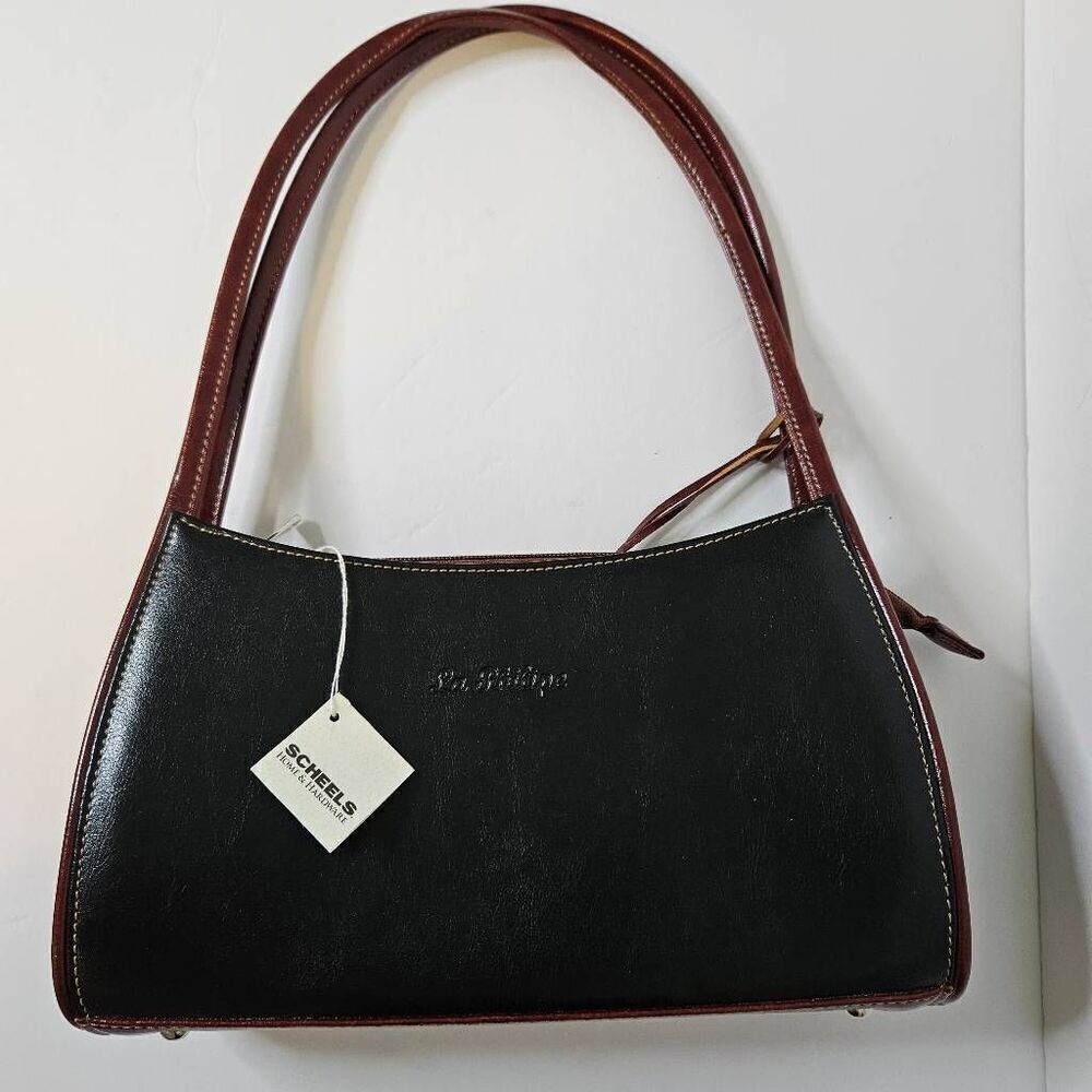 La Philipe black and brown handbag with a small crossbody inside. NWT.